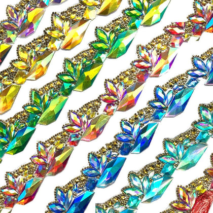 Our iron on trim collection is one our best selling trimmings in our store. Beautiful resin acrylic stones and rhinestones in different styles are attached to a transparent gel back film which is heat activated or iron on.